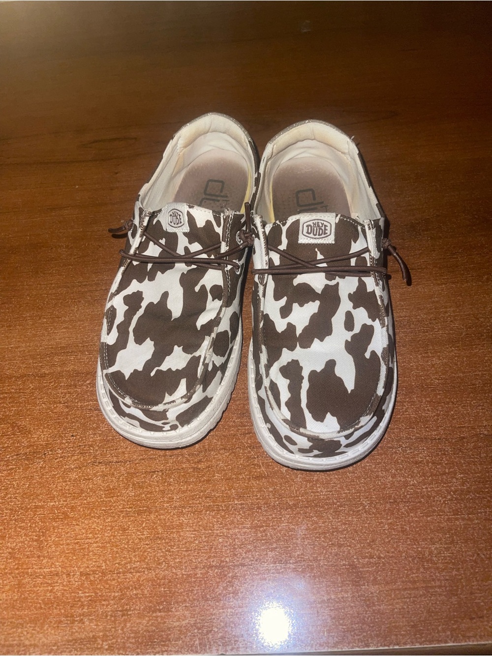 Hey Dude Women's Brown and White Cow Print Slip-On Slippers